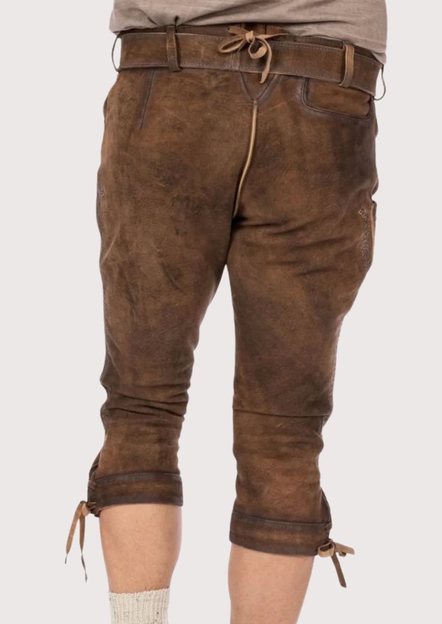 Men’s versatile Bundhosen with premium leather and detailed embroidery, offering warmth, style, and flexibility for all cold-weather events.