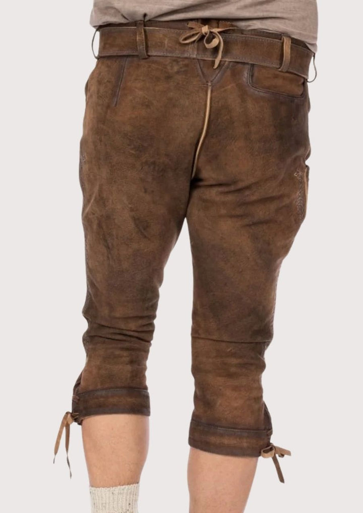 Men’s versatile Bundhosen with premium leather and detailed embroidery, offering warmth, style, and flexibility for all cold-weather events.
