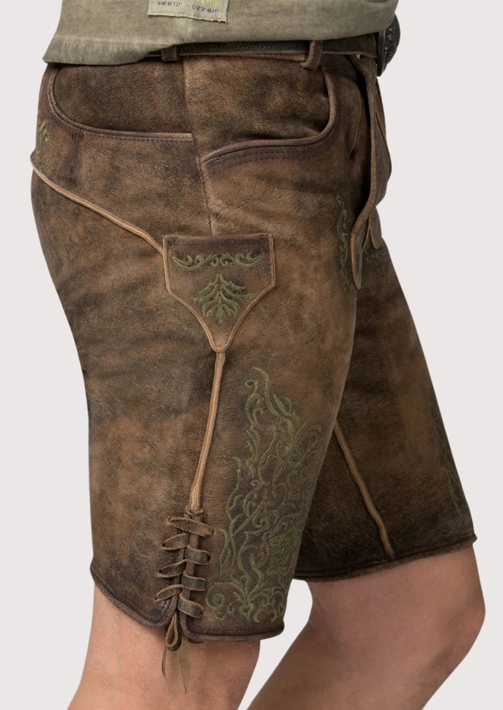 Vintage brown alpine lederhosen with folk embroidery and classic heritage leather finish